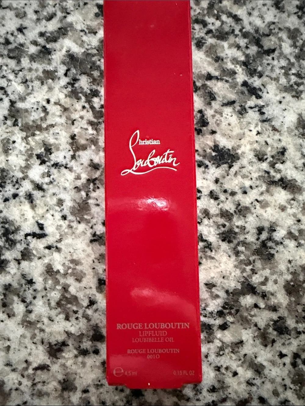Christian Louboutin Rouge Lip Oil in Vibrant Red